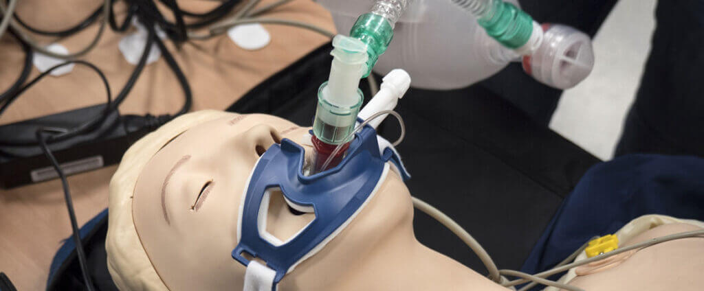 Dummy with breathing apparatus attached for trining purposes