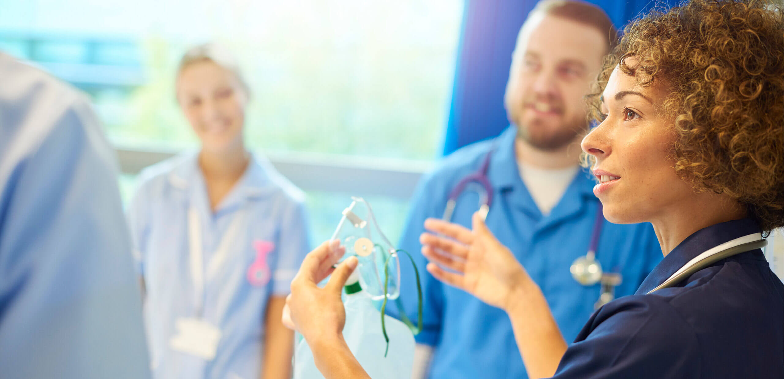Women healthcare worker leading training session