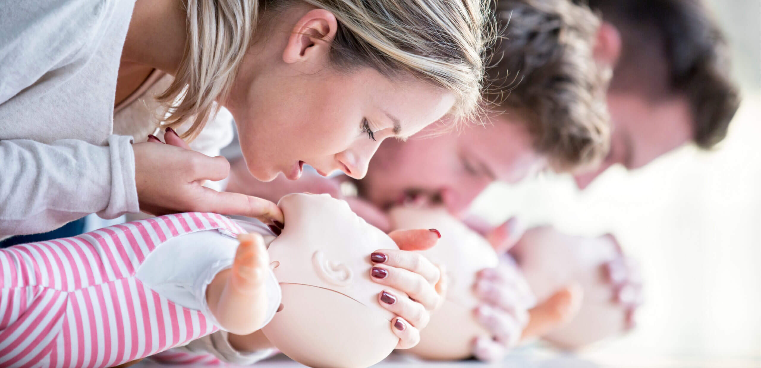 Training sessions practicing on a baby that is a dummy